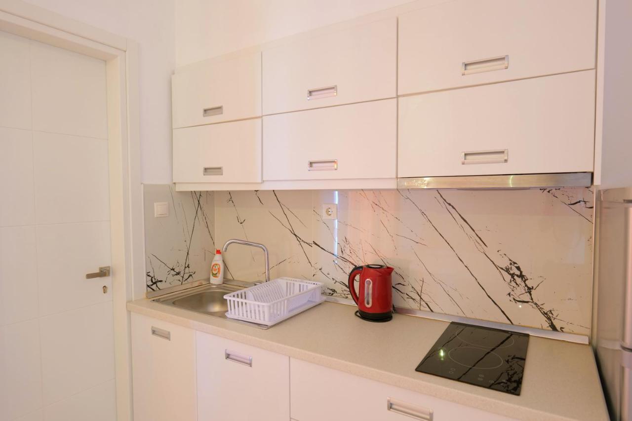 Vila Unique Aparthotel Ksamil Esterno foto